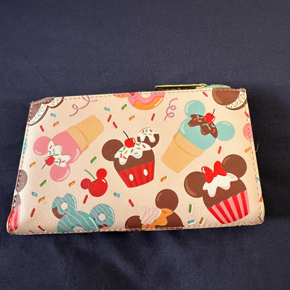 Lounge fly Mickey wallet 
Used
Please see pictures for wear and tear - Picture 2 of 5